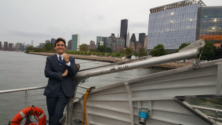 Council Member Ben Kallos rides the Ferry past Roosevelt Island